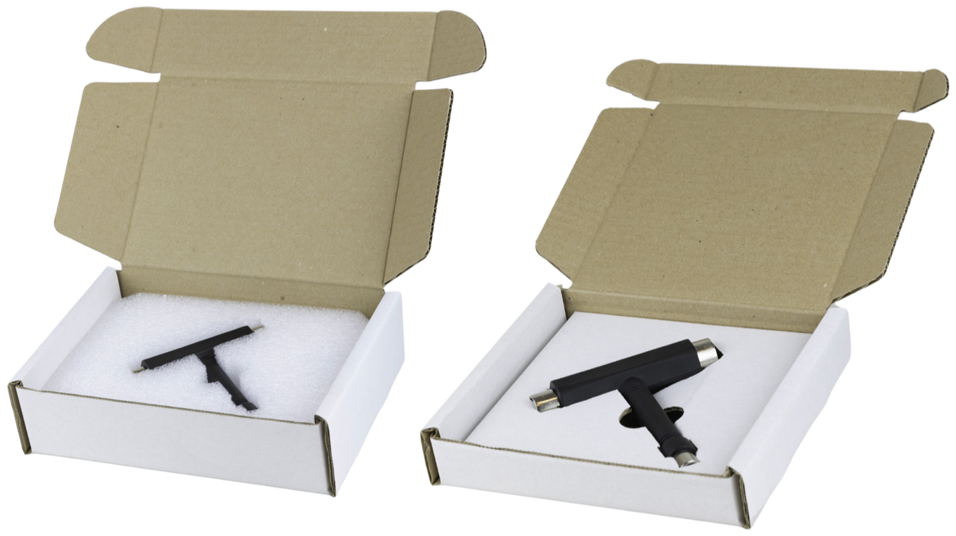 Two boxes with bespoke packaging.